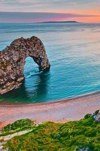 blue sea and golden sand at durdle door dorset uk